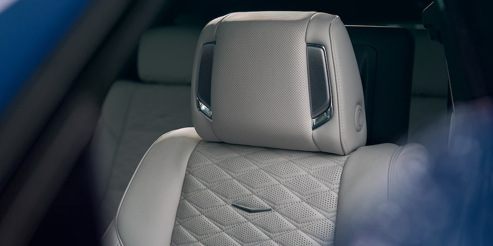 Escalade MCM front headrest with speaker 